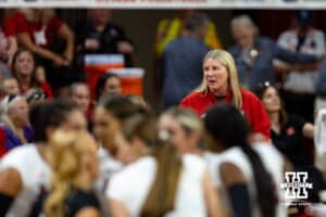 Nebraska Cornhusker head coach Dani Busboom meets with the players in a break in the action during the Red/White Scrimmage on Saturday, Aug. 9, 2025 in Lincoln, Nebraska. Photo by John S. Peterson.