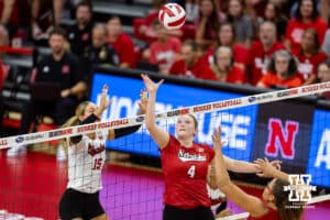 Nebraska Cornhusker Campbell Flynn (4) sets the ball for Rebekah Allick (5) against Andi Jackson (15) in the first set during the Red/White Scrimmage on Saturday, Aug. 9, 2025 in Lincoln, Nebraska. Photo by John S. Peterson.