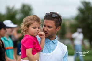 Dad talks to daughter during The Pinnacle Bank Championship on August 9th, 2025, in Omaha, Nebraska. Photo by Brandon Tiedemann.