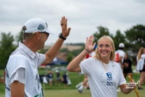 Norah Gessert high-fives during The Pinnacle Bank Championship on August 9th, 2025, in Omaha, Nebraska. Photo by Brandon Tiedemann.