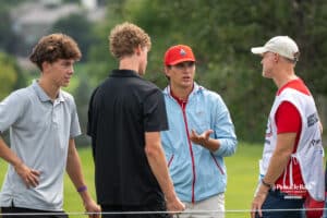 Jackson Benge talks with a group during The Pinnacle Bank Championship on August 9th, 2025, in Omaha, Nebraska. Photo by Brandon Tiedemann.