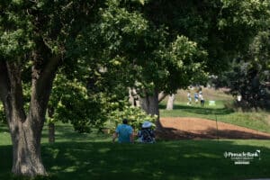 Fans find shade during The Pinnacle Bank Championship on August 8th, 2025, in Omaha, Nebraska. Photo by Brandon Tiedemann.