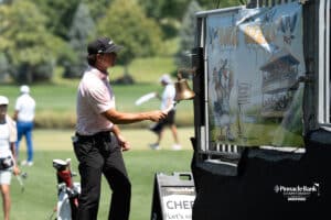 A golfer rings the Birdie Beers bell during The Pinnacle Bank Championship on August 8th, 2025, in Omaha, Nebraska. Photo by Brandon Tiedemann.