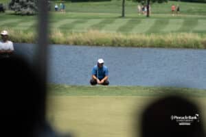 A golfer preparing to chip onto the green during The Pinnacle Bank Championship on August 8th, 2025, in Omaha, Nebraska. Photo by Brandon Tiedemann.