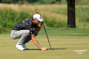 A golfer prepares to putt during The Pinnacle Bank Championship on August, 7th, 2025 in Omaha Nebraska. Photo by Brandon Tiedemann.