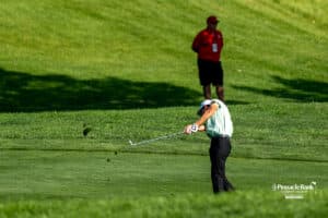 A golfer chips the ball during The Pinnacle Bank Championship on August, 7th, 2025 in Omaha Nebraska. Photo by Brandon Tiedemann.