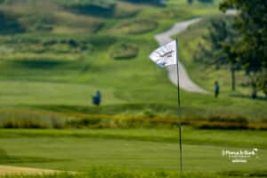 Flag blows in the wind during The Pinnacle Bank Championship on August, 7th, 2025 in Omaha Nebraska. Photo by Brandon Tiedemann.