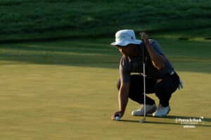 A golfer prepares to putt during The Pinnacle Bank Championship on August, 7th, 2025 in Omaha Nebraska. Photo by Brandon Tiedemann.