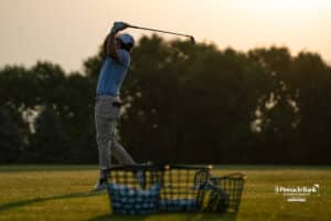 A golfer practicing before the start of the The Pinnacle Bank Championship on August, 7th, 2025 in Omaha Nebraska. Photo by Brandon Tiedemann.