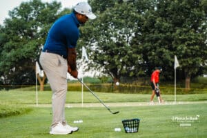 A golfer chips the ball warmoing for The Pinnacle Bank Championship on August, 7th, 2025 in Omaha Nebraska. Photo by Brandon Tiedemann.