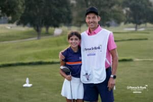 Audrey Johnson and her dad pose for a photo during The Pinnacle Bank Championship on August 7th, 2025 in Omaha Nebraska. Photo by Brandon Tiedemann.