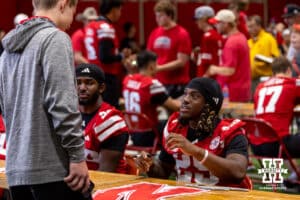 Nebraska Cornhusker Kenneth Williams (25) signs an autograph during Nebraska’s football Fan Day on Saturday, Aug. 2, 2025 in Lincoln, Nebraska. Photo by John S. Peterson.