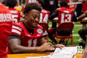 Nebraska Cornhusker Cameron Lenhardt (11) signs a preview magazine during Nebraska’s football Fan Day on Saturday, Aug. 2, 2025 in Lincoln, Nebraska. Photo by John S. Peterson.
