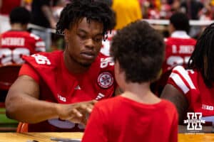 Nebraska Cornhusker Williams Nwaneri (96) signs an autograph during Nebraska’s football Fan Day on Saturday, Aug. 2, 2025 in Lincoln, Nebraska. Photo by John S. Peterson.