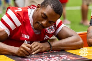 Nebraska Cornhusker Marques Buford Jr. (3) signs an autograph during Nebraska’s football Fan Day on Saturday, Aug. 2, 2025 in Lincoln, Nebraska. Photo by John S. Peterson.