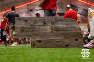 Collection of autogaphs on a wooden Nebraska cutout during Nebraska’s football Fan Day on Saturday, Aug. 2, 2025 in Lincoln, Nebraska. Photo by John S. Peterson.