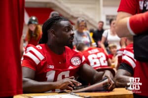 Nebraska Cornhusker Janiran Bonner (16) signs an autograph during Nebraska’s football Fan Day on Saturday, Aug. 2, 2025 in Lincoln, Nebraska. Photo by John S. Peterson.