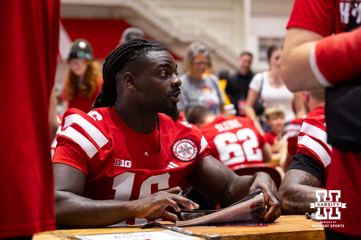 Nebraska Cornhusker Janiran Bonner (16) signs an autograph during Nebraska’s football Fan Day on Saturday, Aug. 2, 2025 in Lincoln, Nebraska. Photo by John S. Peterson.