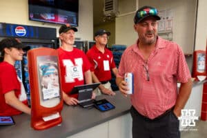 Nebraska fan Ryan Knutson buying a beer at the first event that beer sales made available during Nebraska’s football open scrimmage on Saturday, Aug. 2, 2025 in Lincoln, Nebraska. Photo by John S. Peterson.