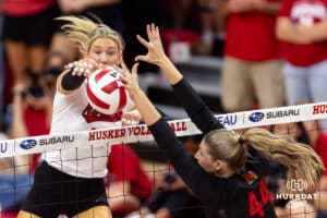 Nebraska Cornhusker middle blocker Andi Jackson (15) spikes the ball against Maryland Terrapin middle blocker Eva Rohrbach (44) in the second set during a college volleyball match on Saturday, September 27, 2025, in Lincoln, Nebraska. Photo by John S. Peterson.