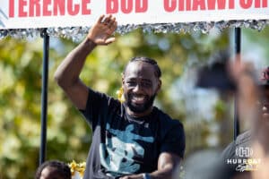 Terrence "Bud" Crawford gestures to the crowd during a Victory Parade, Saturday, September 27th, 2025, Omaha, Nebraska. Photo by Braden Cochran.