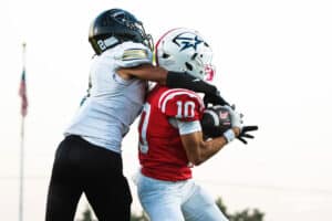 Owen Zech catches a contested ball for a touchdown during the Millard South football game vs Lincoln Southeast on September 25th, 2025 in Omaha, Nebraska. Photo by Drew Balus
