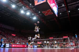 Nebraska Cornhusker Andi Jackson (15) serves the ball against the Michigan Wolvines in the third set during a college volleyball match on Wednesday, September 24, 2025, in Lincoln, Nebraska. Photo by John S. Peterson.