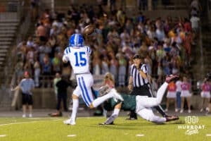 Bennington wide receiver Parker Douglas catches a deep touchdown pass in front of a fallen Gretna defender and student section during a High School Football game, Friday, September 26th, 2025, Gretna, Nebraska. Photo by Braden Cochran.