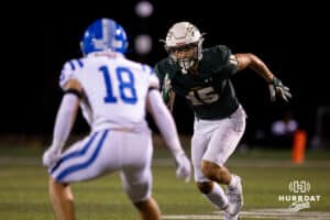 Gretna wide reciever Bryce Lakers (15) explodes into his route while staring down a Bennington defender during a High School Football game, Friday, September 26th, 2025, Gretna, Nebraska. Photo by Braden Cochran.