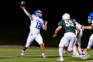 Bennington quarterback Ty Buaphakeo (12) heaves the ball downfield while under pressure during a High School Football game, Friday, September 26th, 2025, Gretna, Nebraska. Photo by Braden Cochran.