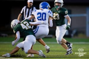 Bennington Badger Will Gutz (20) makes a spin move away from a Gretna defender during a High School Football game, Friday, September 26th, 2025, Gretna, Nebraska. Photo by Braden Cochran.