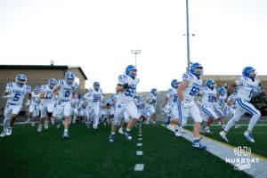 The Bennington Badgers run onto the field during a High School Football game, Friday, September 26th, 2025, Gretna, Nebraska. Photo by Braden Cochran.