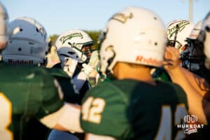 Gretna Runningbacks break a huddle down before regrouping with their team during a High School Football game, Friday, September 26th, 2025, Gretna, Nebraska. Photo by Braden Cochran.