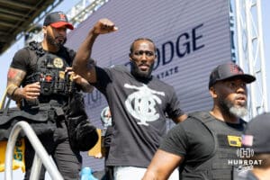 Terence Crawford makes his way off the stage, led by security, during the Terence "Bud" Crawford World Champion Victory Parade, Saturday, September 27, 2025, Omaha, Nebraska. Photo by Braden Cochran.