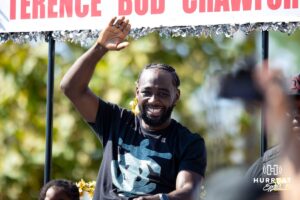 Terence "Bud" Crawford waves to the crowd during the Terence "Bud" Crawford World Champion Victory Parade, Saturday, September 27, 2025, Omaha, Nebraska. Photo by Braden Cochran.