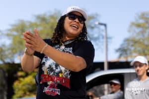 A lady cheers with the crowd of the parade during the Terence "Bud" Crawford World Champion Victory Parade, Saturday, September 27, 2025, Omaha, Nebraska. Photo by Braden Cochran.