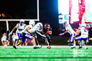 Westside's Tay Tay Jenkins (6) fighting for extra yards during a high school football game VS Omaha Central on Friday, September 26, 2025, in Omaha, Nebraska. Photo By Jack R. Stephens