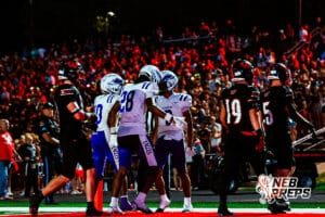 Omaha Central's Yasir Grixby (2) and Kaprice Keith (28) celebrate after scoring a touchdown during a high school football game @ Westside on Friday, September 26, 2025, in Omaha, Nebraska. Photo By Jack R. Stephens