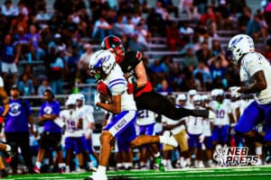 Omaha Centrals Yasir Grixby (2) brushing off a defender to get extra yards during a high school football game @ Westside on Friday, September 26 2025 in Omaha, Nebraska. Photo By Jack R. Stephens