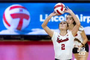 Nebraska Cornhusker setter Bergen Reilly (2) set the ball against the Maryland Terrapins in the second set during a college volleyball match on Saturday, September 27, 2025, in Lincoln, Nebraska. Photo by John S. Peterson.