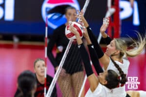 Nebraska Cornhusker outside hitter Harper Murray (27) with middle blocker Andi Jackson (15) blocks the ball against the Maryland Terrapins in the second set during a college volleyball match on Saturday, September 27, 2025, in Lincoln, Nebraska. Photo by John S. Peterson.