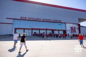 Nebraska Cornhuskers fan make their way to the John Cook Arena for a college volleyball match against the Maryland Terrapins on Saturday, September 27, 2025, in Lincoln, Nebraska. Photo by John S. Peterson.