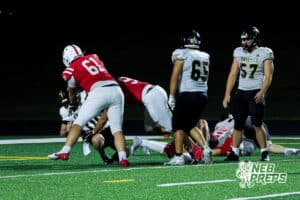 Matthew Butts and MJ Wash sack the QB during the Millard South football game vs Lincoln Southeast on September 25th, 2025 in Omaha, Nebraska. Photo by Drew Balus