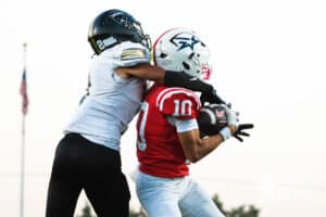 Owen Zech catches a contested ball for a touchdown during the Millard South football game vs Lincoln Southeast on September 25th, 2025, in Omaha, Nebraska. Photo by Drew Balus.