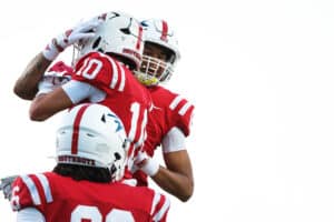 Owen Zech and Dallas Gaius-Anyaegbu celebrate after a touchdown during the Millard South football game vs Lincoln Southeast on September 25th, 2025, in Omaha, Nebraska. Photo by Drew Balus.