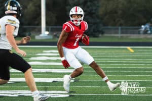 Amarion Jackson cuts during the Millard South football game vs Lincoln Southeast on September 25th, 2025, in Omaha, Nebraska. Photo by Drew Balus.