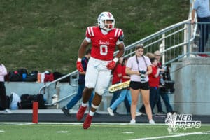 Daxton Williams smiles after the sack during the Millard South football game vs Lincoln Southeast on September 25th, 2025, in Omaha, Nebraska. Photo by Drew Balus.