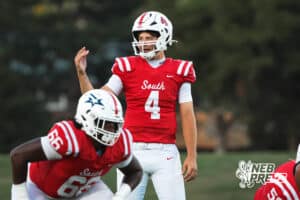 Jett Thomalla calls a play during the Millard South football game vs Lincoln Southeast on September 25th, 2025, in Omaha, Nebraska. Photo by Drew Balus.