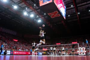 Nebraska Cornhusker Andi Jackson (15) serves the ball against the Michigan Wolverines in the third set during a college volleyball match on Wednesday, September 24, 2025, in Lincoln, Nebraska. Photo by John S. Peterson.