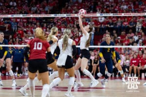 Nebraska Cornhusker Bergen Reilly (2) sets the ball against the Michigan Wolverines in the third set during a college volleyball match on Wednesday, September 24, 2025, in Lincoln, Nebraska. Photo by John S. Peterson.